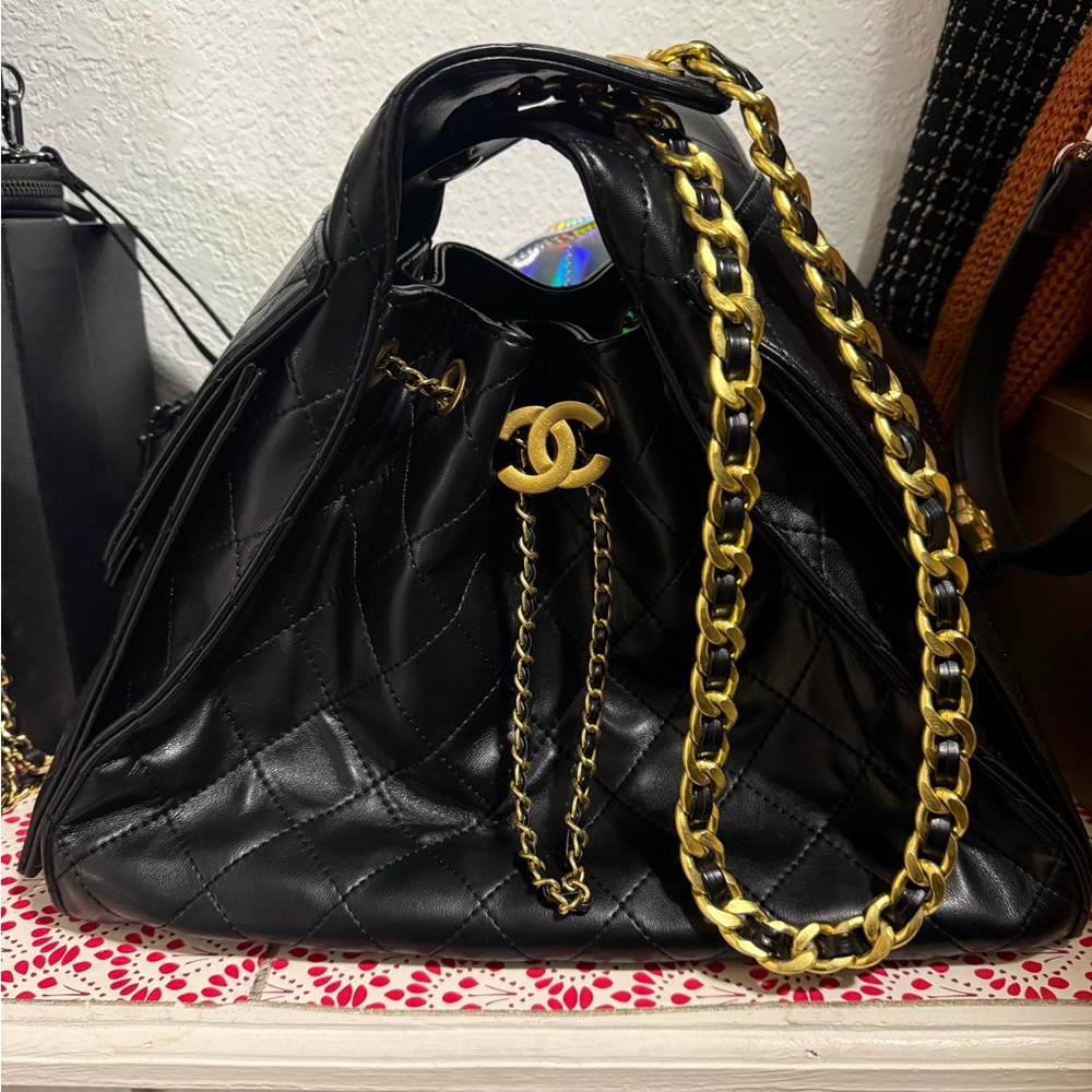 Black Quilted Bag with Gold Chain Accent